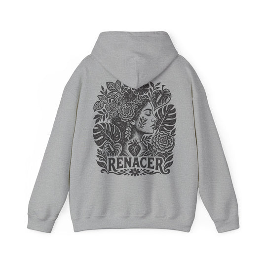 A light gray pullover hoodie shown from the back, featuring a large black graphic print of a woman's face surrounded by tropical leaves and the word 'RENACER' at the bottom.