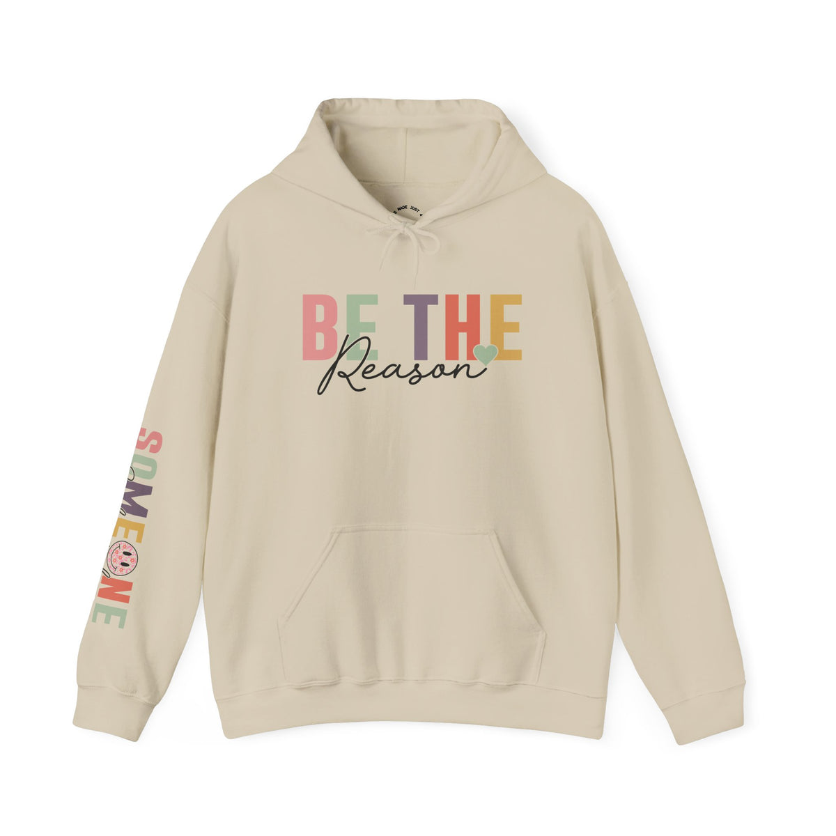A beige pullover hoodie with a colorful graphic on the chest reading 'BE THE Reason' and 'Someone Smiles' with a smiley face printed down the right sleeve, shown on a plain white background.