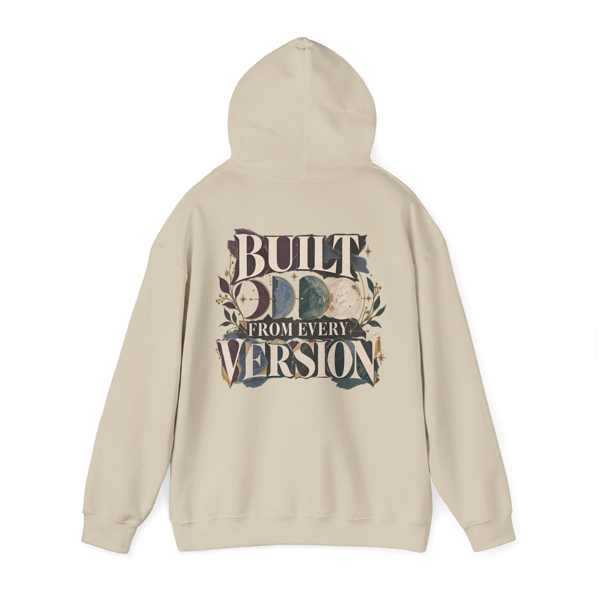 A beige pullover hoodie shown from the back, featuring a large graphic print with the words 'BUILT FROM EVERY VERSION' and a moon phase design in muted earthy tones.