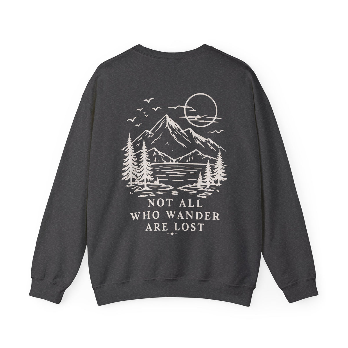 A dark charcoal gray crewneck sweatshirt shown from the back, featuring a cream line art graphic of a mountain, lake, pine trees, and a moon, with the text 'NOT ALL WHO WANDER ARE LOST'.