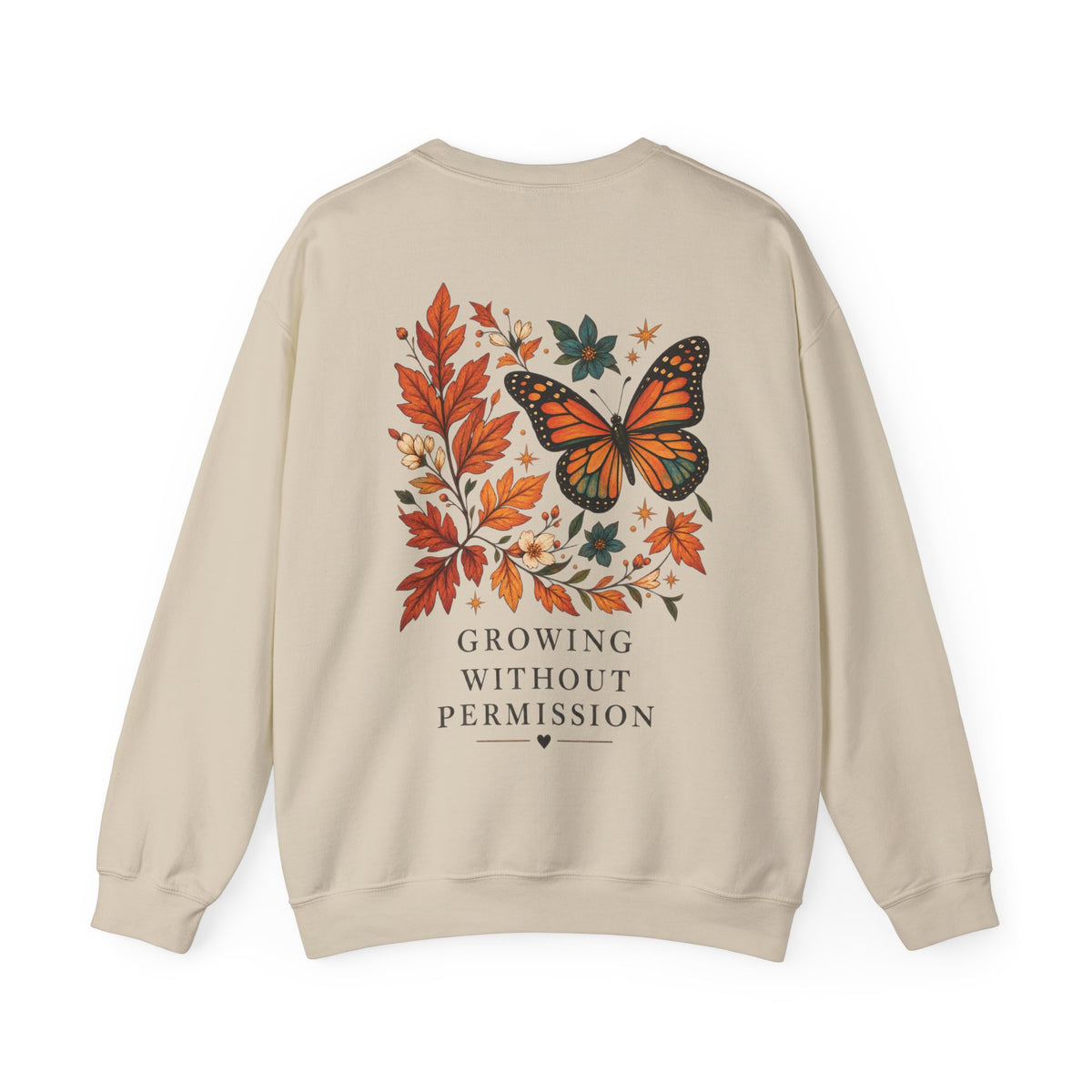 A beige crewneck sweatshirt shown from the back, featuring a graphic print of an orange monarch butterfly surrounded by autumn leaves and the text 'GROWING WITHOUT PERMISSION' in dark gray.