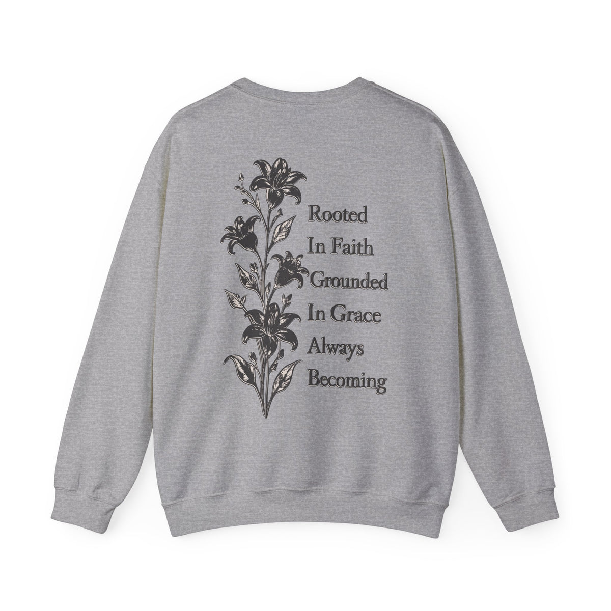 A heather gray crewneck sweatshirt shown from the back, featuring a black graphic of lilies and the text 'Rooted In Faith Grounded In Grace Always Becoming'.