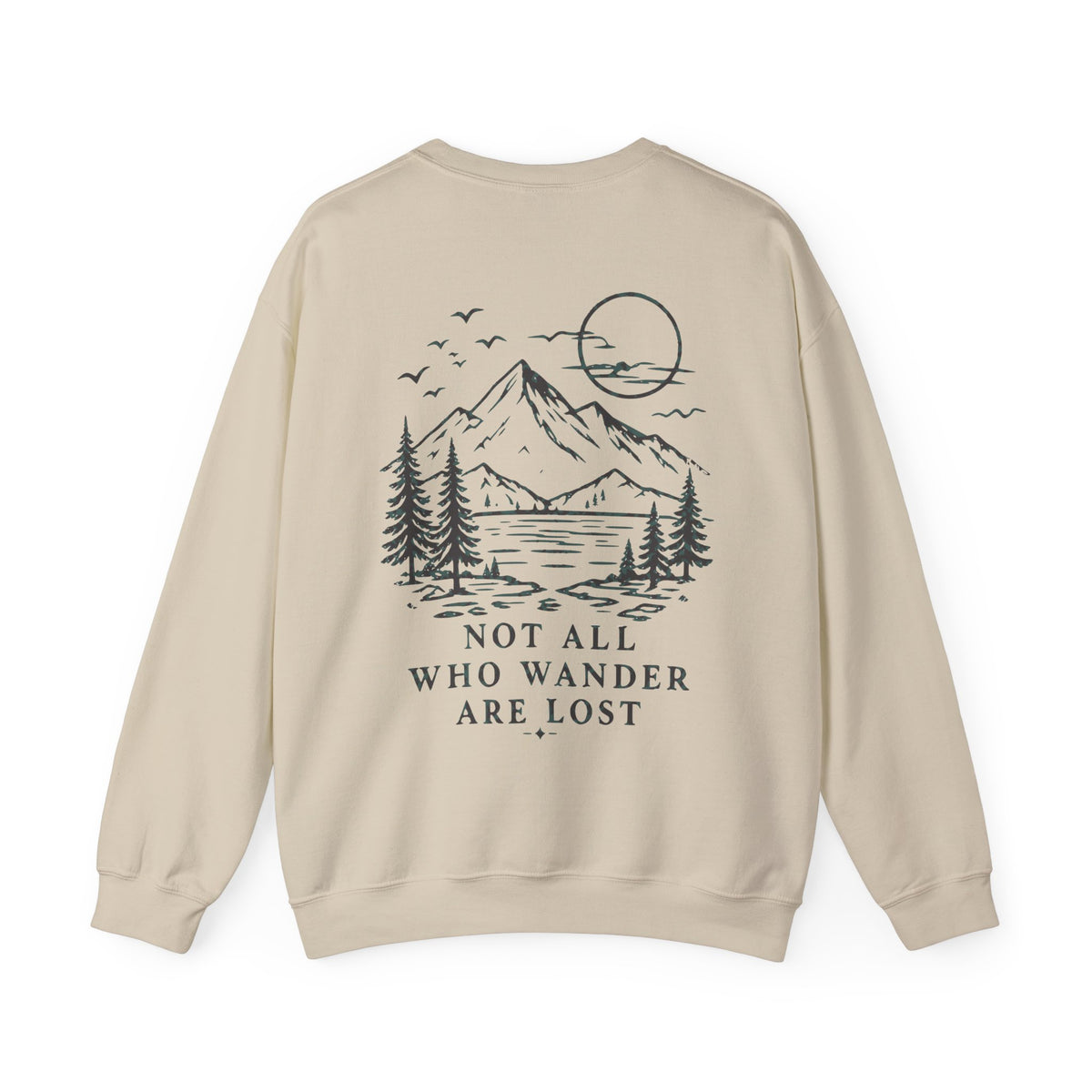 A beige crewneck sweatshirt shown from the back, featuring a dark gray line art graphic of a mountain, lake, pine trees, and a sun, with the text 'NOT ALL WHO WANDER ARE LOST' printed below.