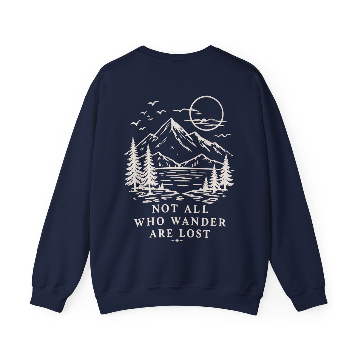 A navy blue crewneck sweatshirt shown from the back, featuring a cream line art graphic of a mountain, lake, pine trees, and a full moon with the text 'NOT ALL WHO WANDER ARE LOST'.