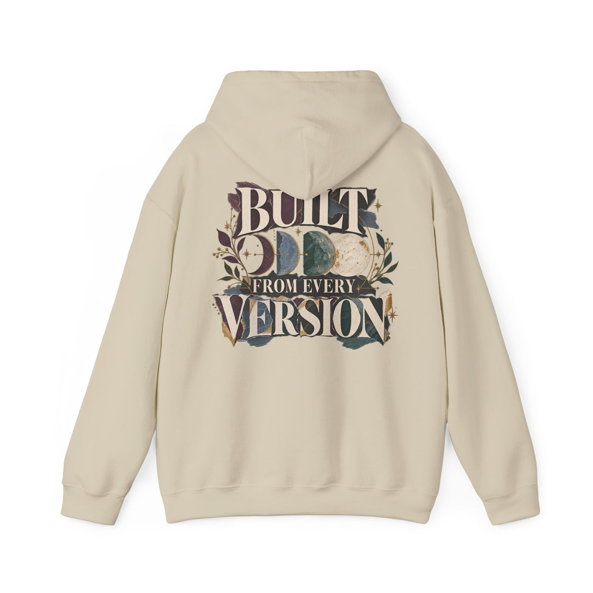 A beige hoodie shown from the back, featuring a large graphic print with the text 'BUILT FROM EVERY VERSION' and a moon phase illustration in muted earthy tones.