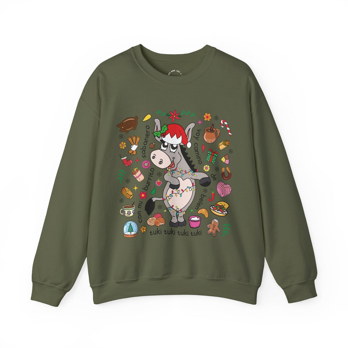An olive green crewneck sweatshirt featuring a festive Christmas donkey graphic in the center, surrounded by holiday treats and decorations, displayed on a clean white background.