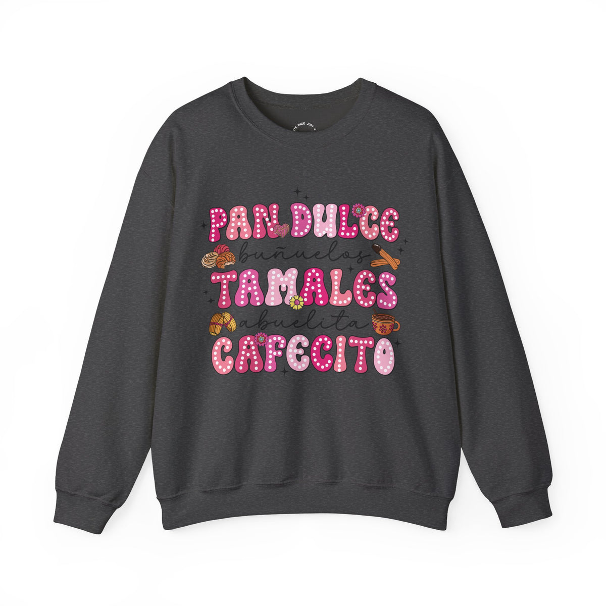 A dark charcoal gray crewneck sweatshirt featuring a colorful graphic print on the front with the Spanish text 'Pan Dulce Bunuelas Tamales Abuelita Cafecito' in pink and brown donut-style lettering with small illustrations of food items.