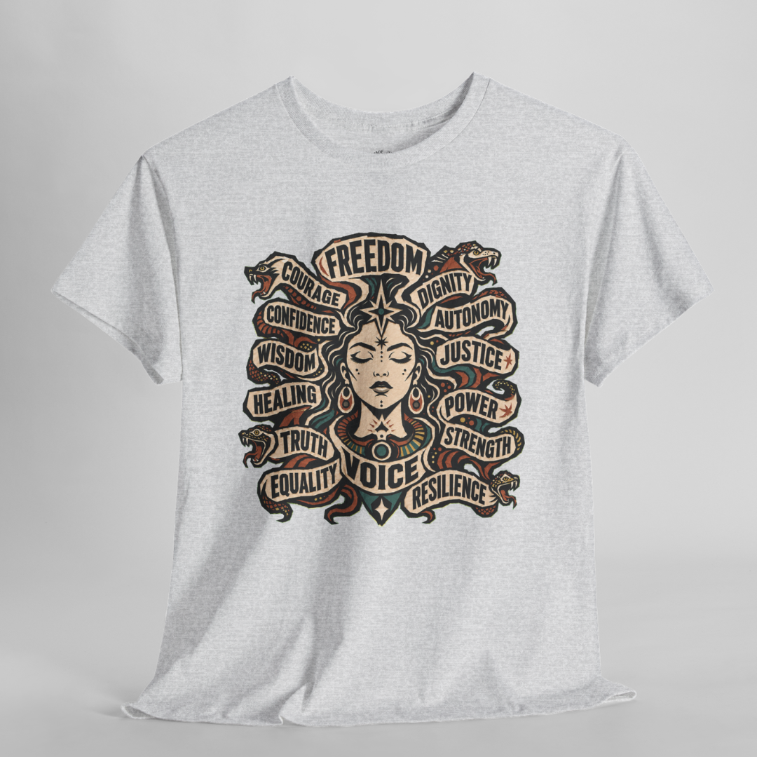 A light heather gray short-sleeve t-shirt with a detailed graphic print of a woman with snakes in her hair, surrounded by words like FREEDOM, COURAGE, and JUSTICE, displayed on a neutral gray background.