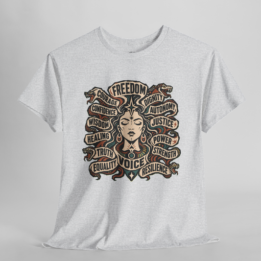 A light heather gray short-sleeve t-shirt with a detailed graphic print of a woman with snakes in her hair, surrounded by words like FREEDOM, COURAGE, and JUSTICE, displayed on a neutral gray background.