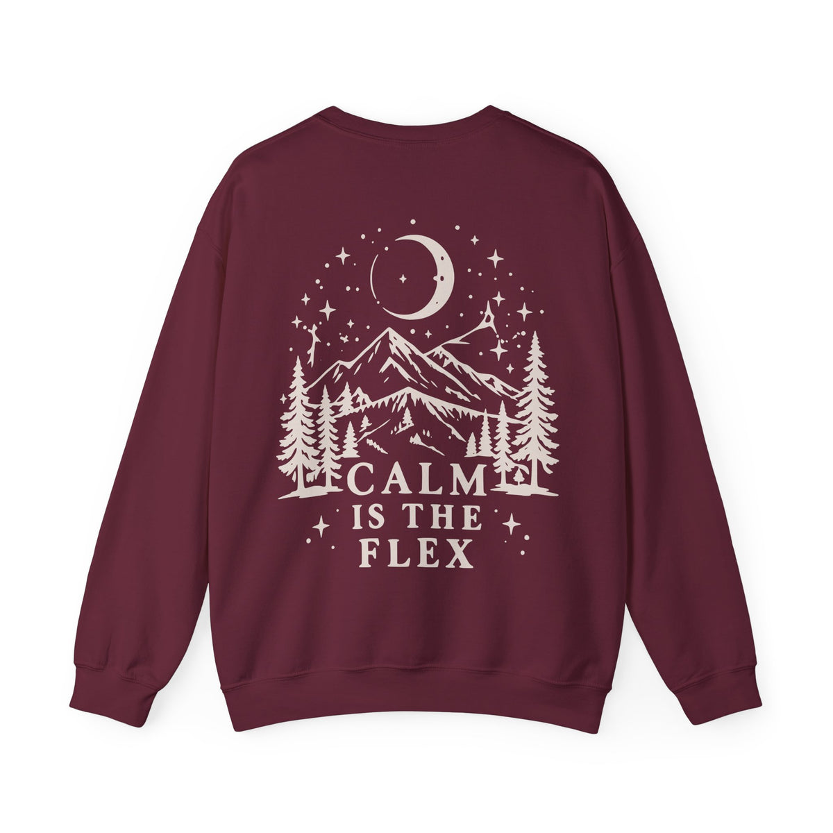 A maroon crewneck sweatshirt shown from the back, featuring a cream graphic print of a mountain, pine trees, a crescent moon, and stars with the text 'CALM IS THE FLEX'.