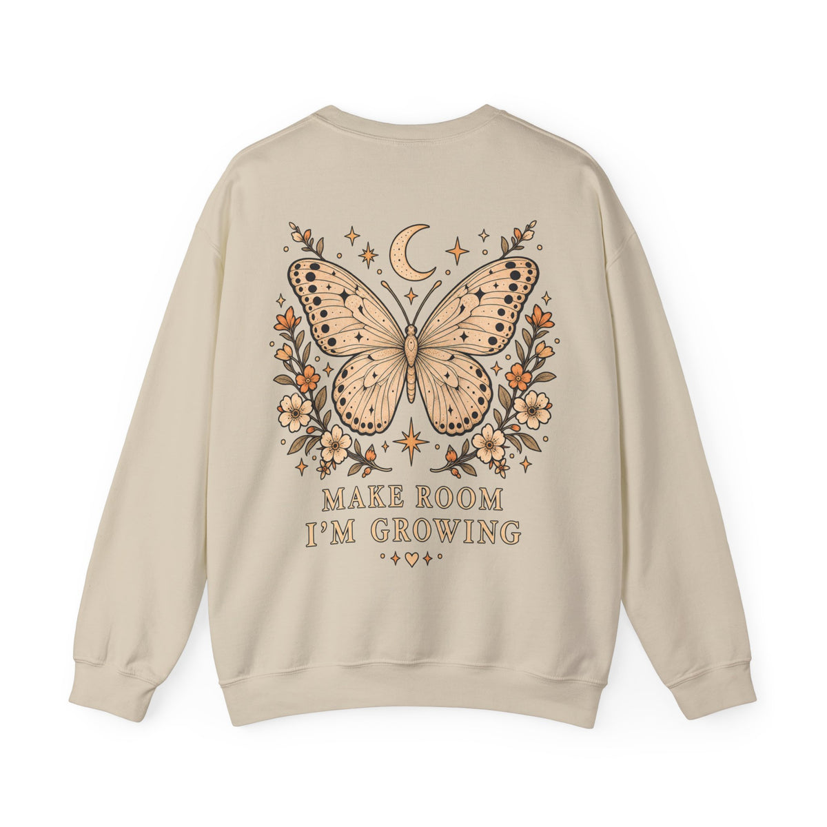 A beige crewneck sweatshirt shown from the back, featuring a large graphic of a butterfly surrounded by flowers, a crescent moon, and stars, with the text 'MAKE ROOM I'M GROWING' printed below.