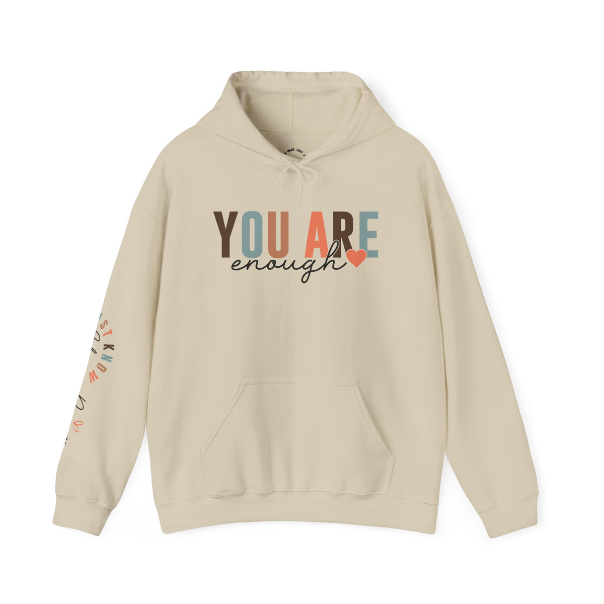 A beige pullover hoodie with a front kangaroo pocket and a graphic text print reading 'YOU ARE enough' on the chest with a small heart and 'Just Know Your Power' on the sleeve, shown on a plain white background.