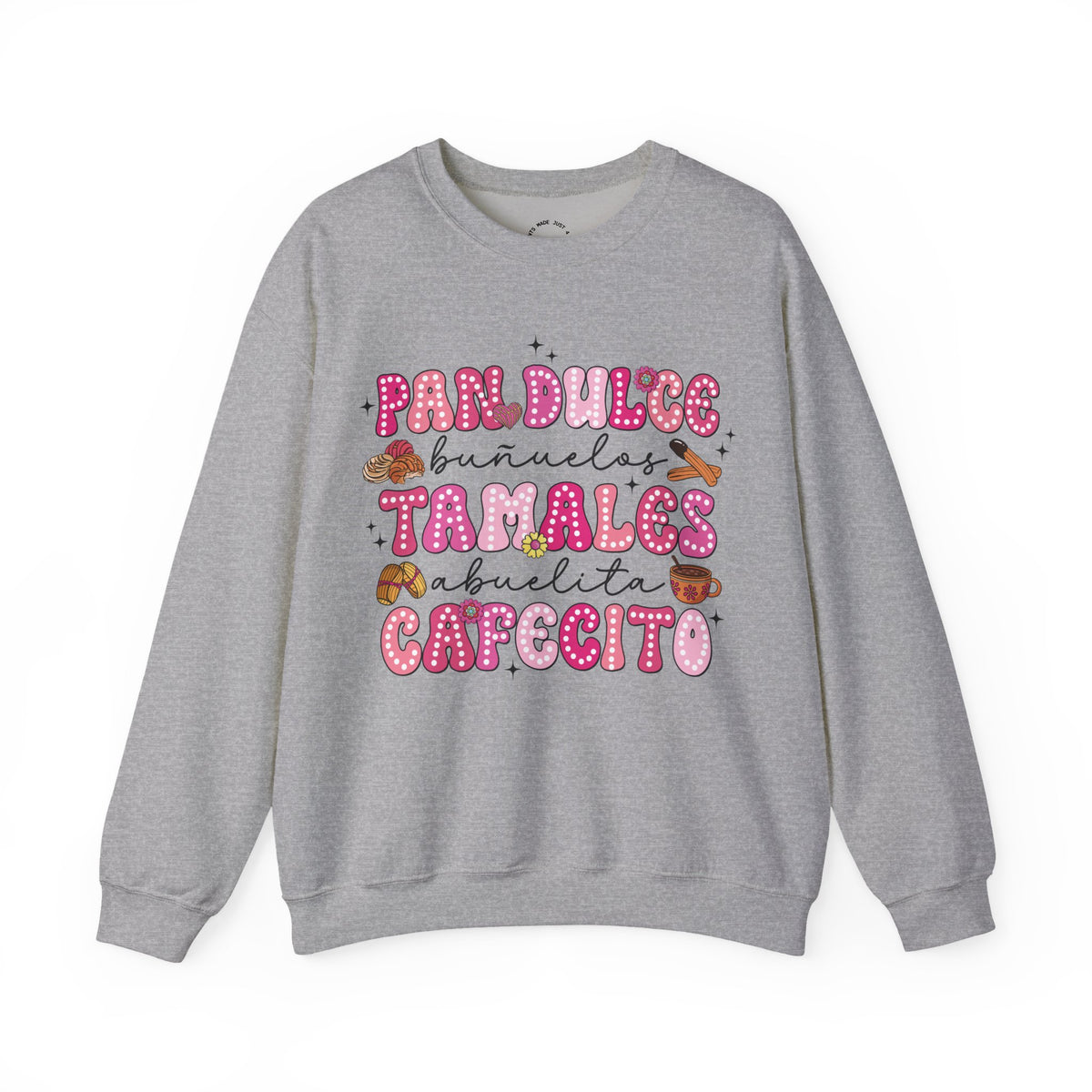 A heather gray crewneck sweatshirt featuring a colorful graphic print on the front with the Spanish text 'Pan Dulce Bunuelas Tamales Abuelita Cafecito' in pink and brown donut-style lettering with small illustrations of food items.