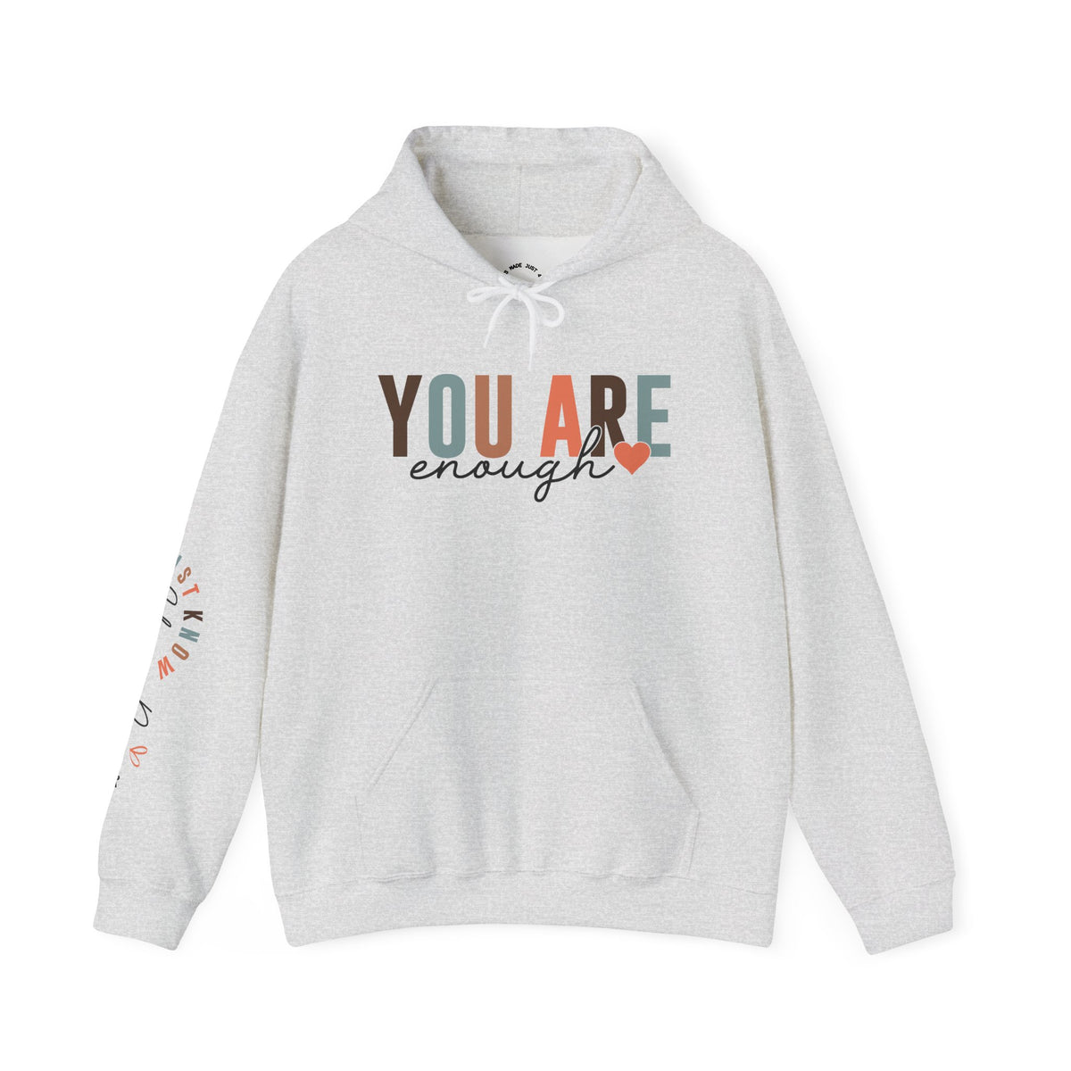 A light heather gray pullover hoodie with a front kangaroo pocket and a graphic text print reading 'YOU ARE enough' on the chest with a small heart and 'Just Know Your Power' on the sleeve, shown against a plain white background.
