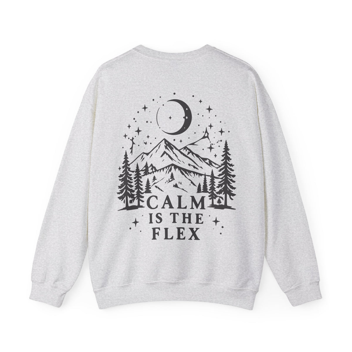 A light heather gray crewneck sweatshirt shown from the back, featuring a black graphic print of a mountain, pine trees, a crescent moon, and stars with the text 'CALM IS THE FLEX'.