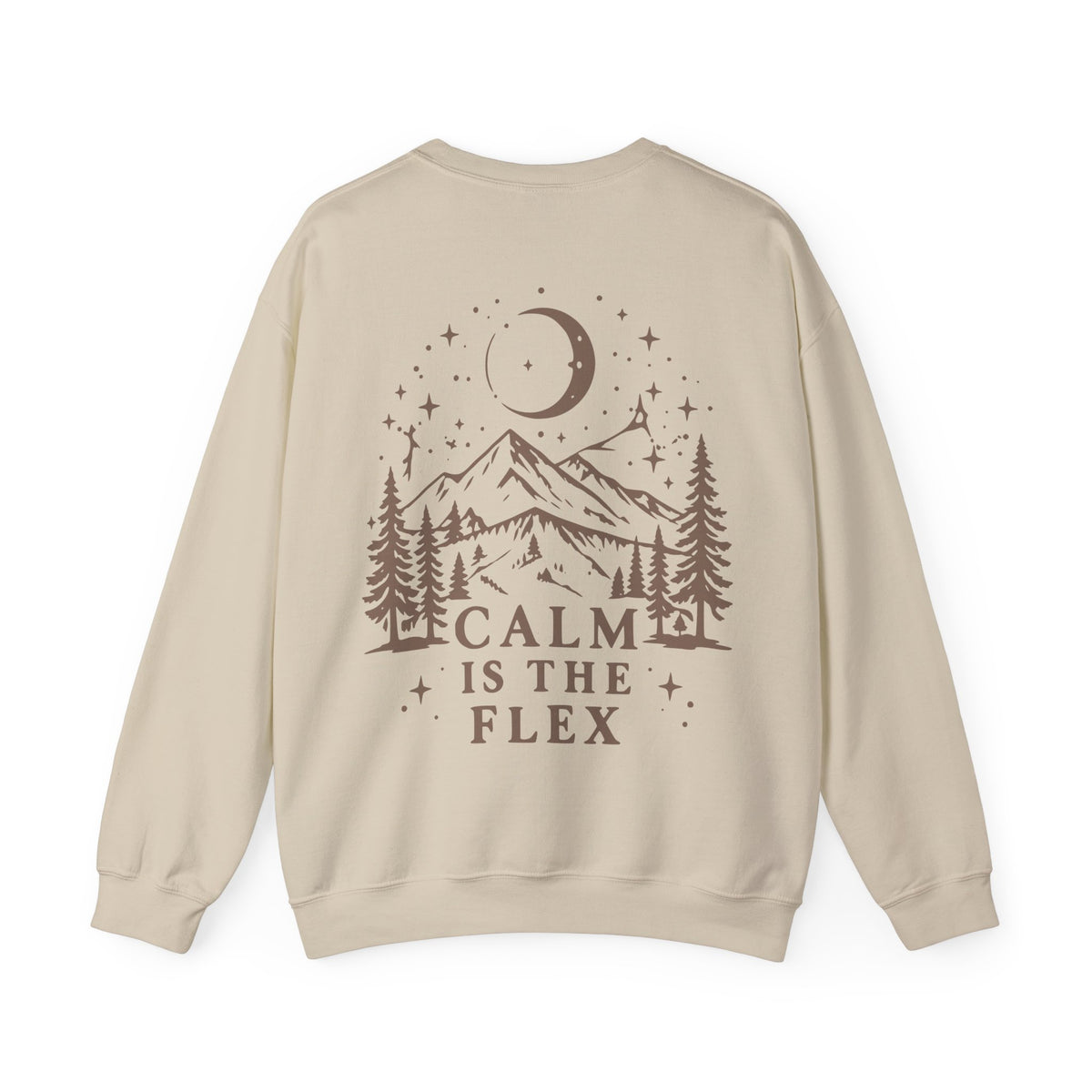 A beige crewneck sweatshirt shown from the back, featuring a brown graphic of a mountain, pine trees, a crescent moon, and stars with the text 'CALM IS THE FLEX'.